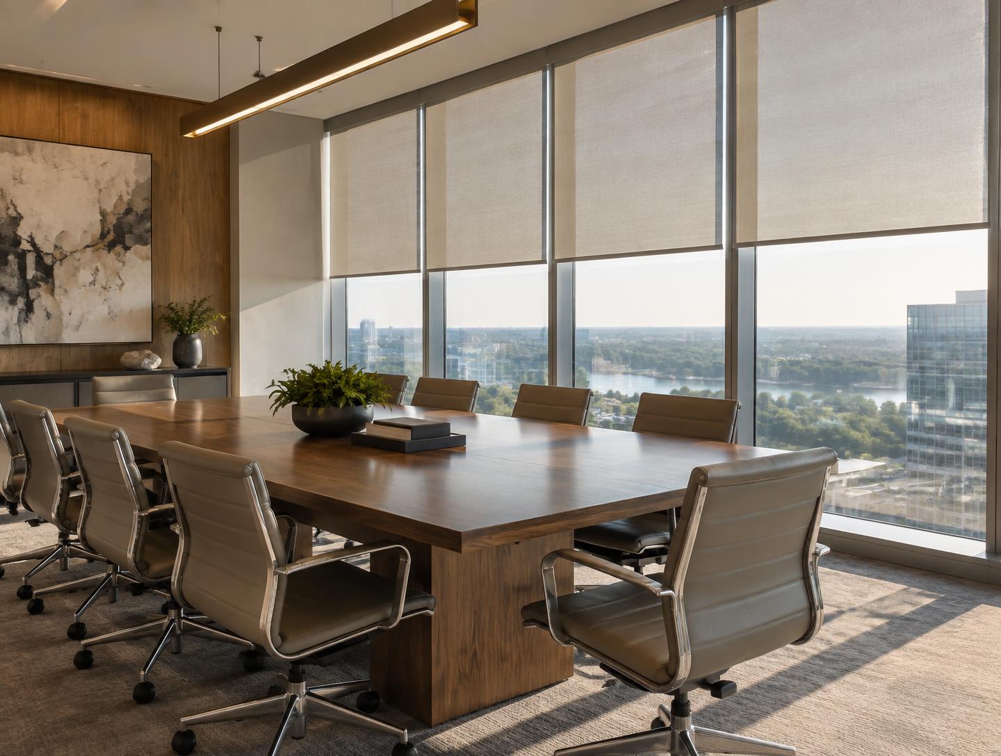 Modern conference room with commercial solar roller shades